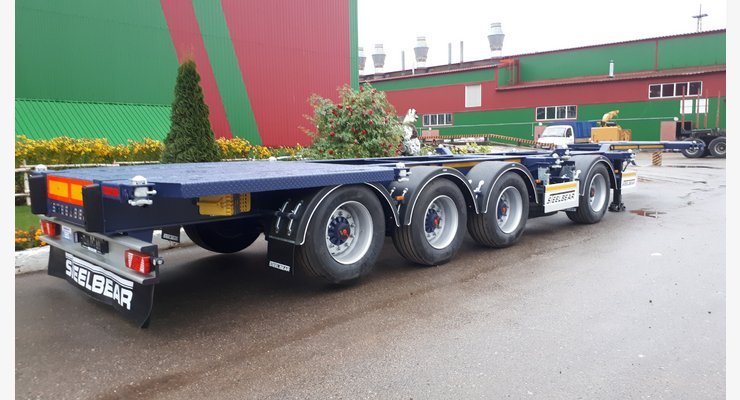 Полуприцеп-контейнеровоз STEELBEAR PF-41N-6 — задний вид и четырехосная группа